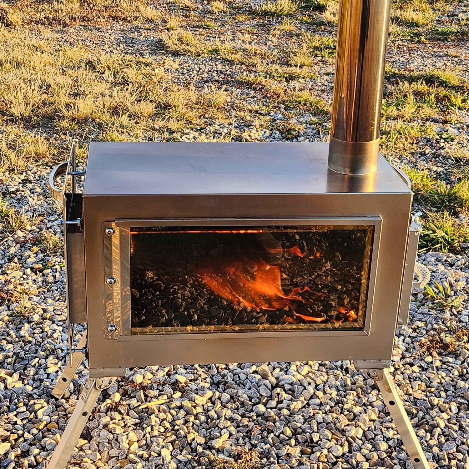 Caminus M tent stove with spark arrestor system