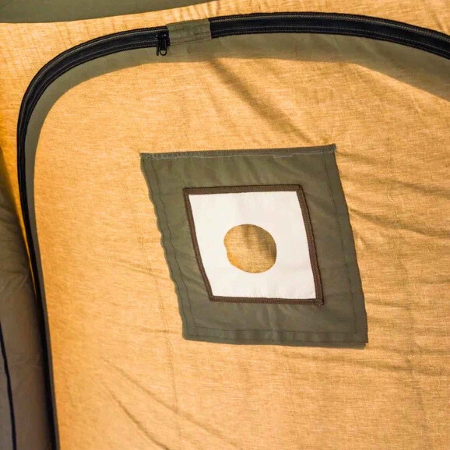 Large inflatable tent with stove jack for winter camping above freezing