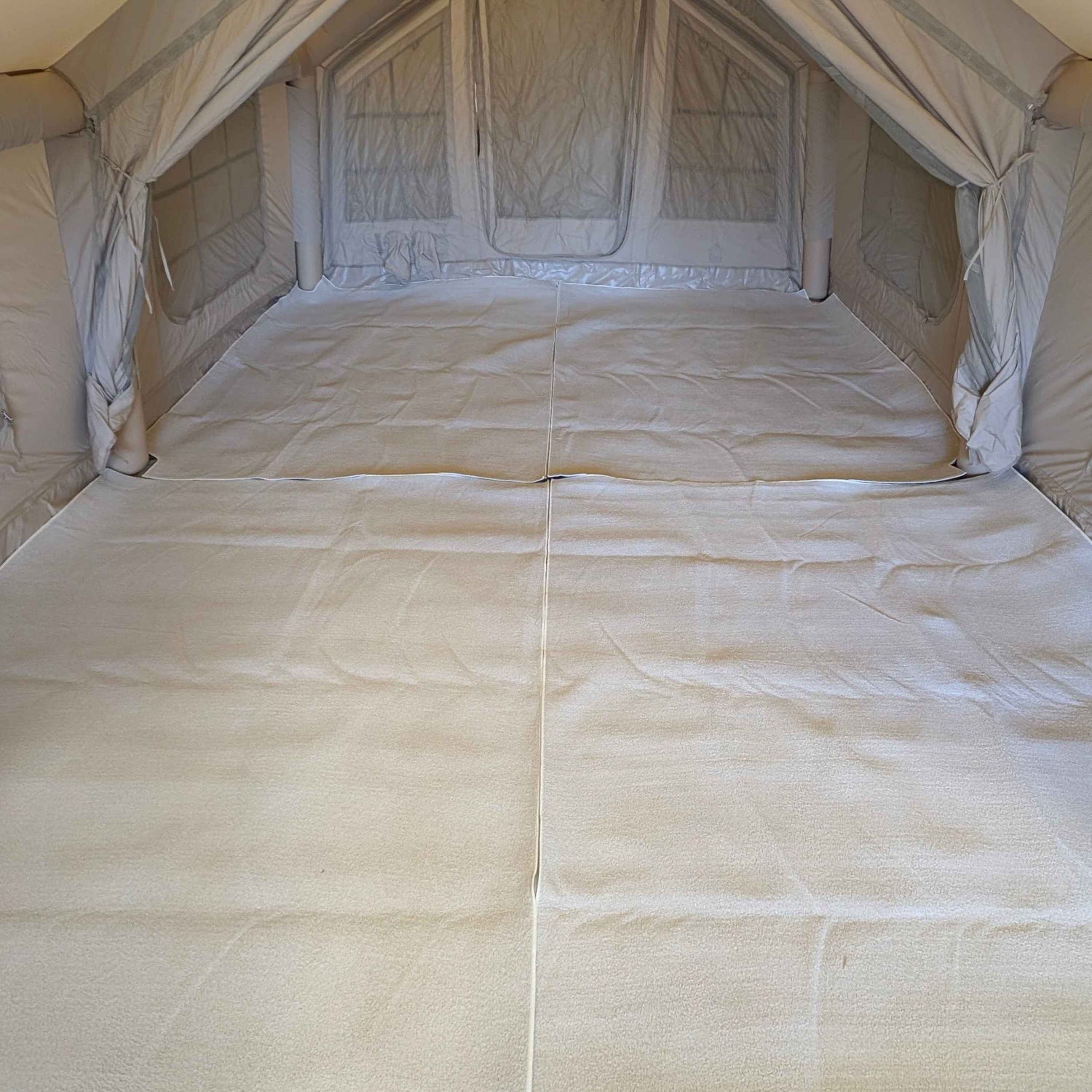 Thick insulated tent flooring for lodge style camping interior