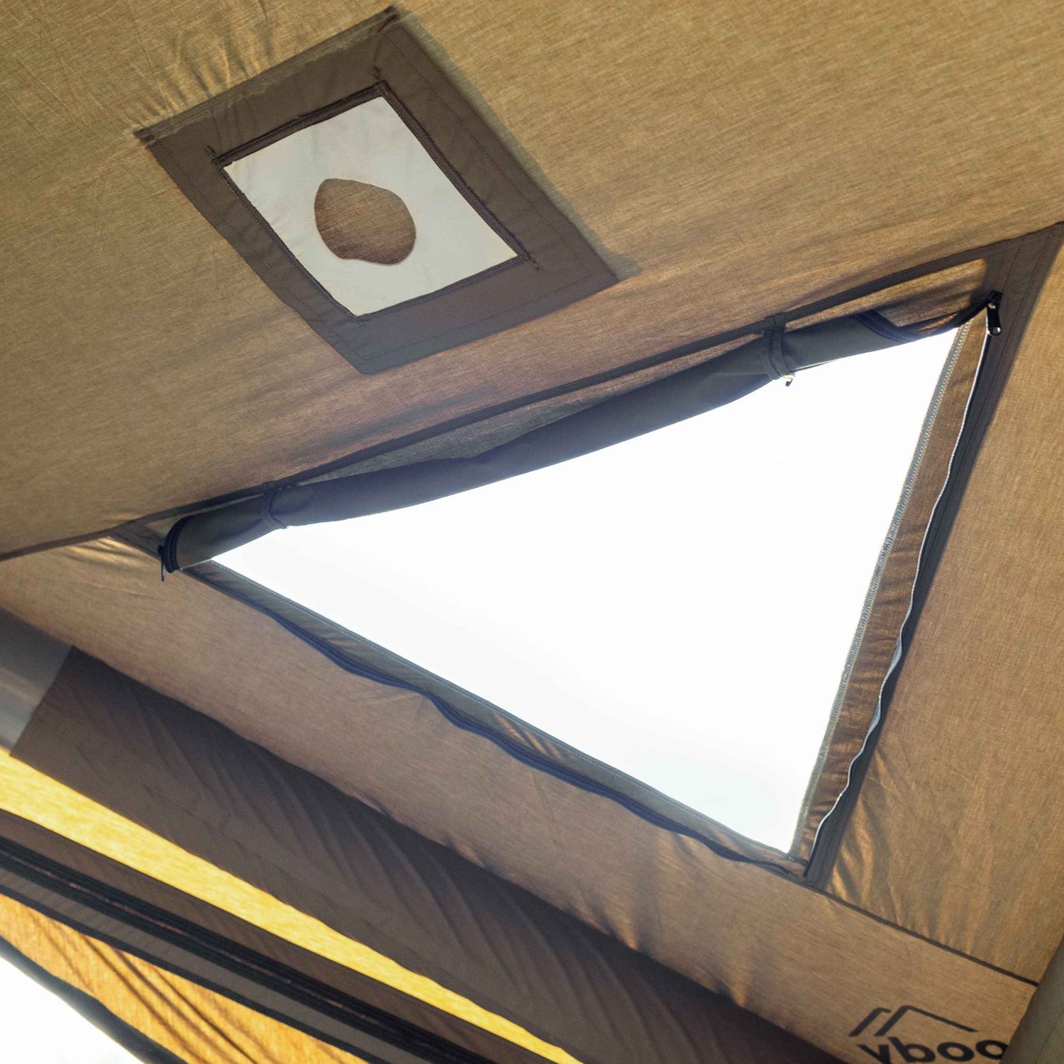 Spacious inflatable basecamp tent for shared lounge and dining area