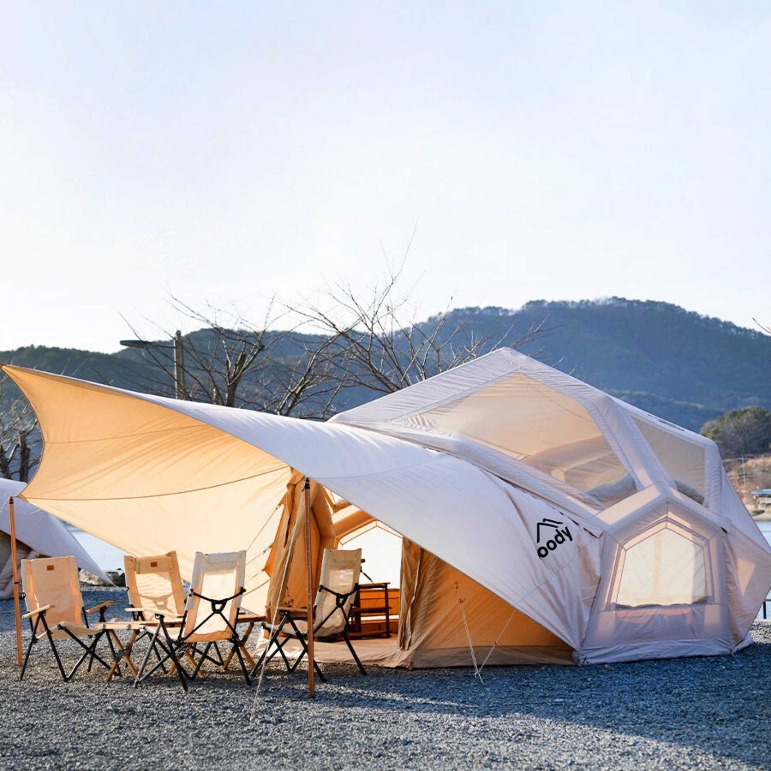 Inflatable camping lodge tent with ceiling TPU panels and natural light