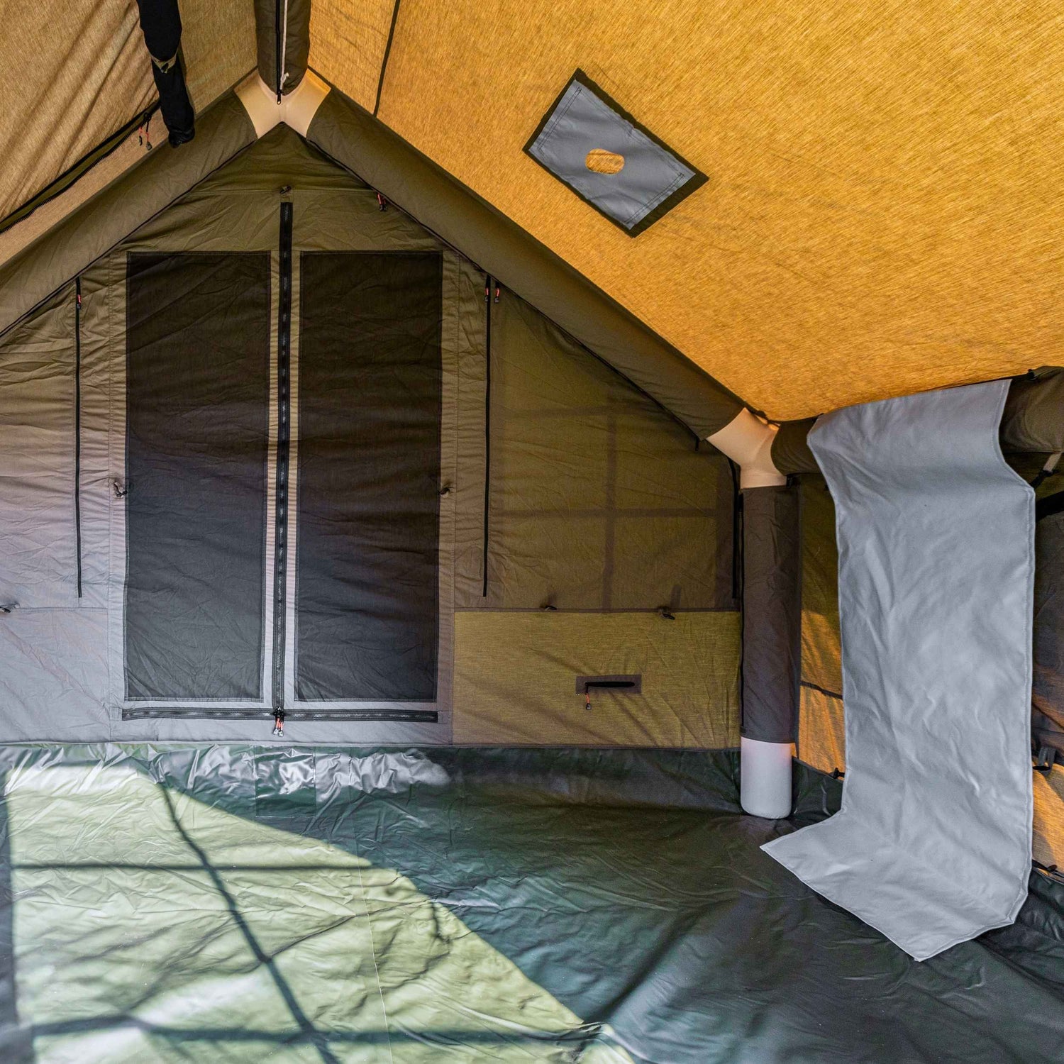 Compact 4 season air tent with roof window