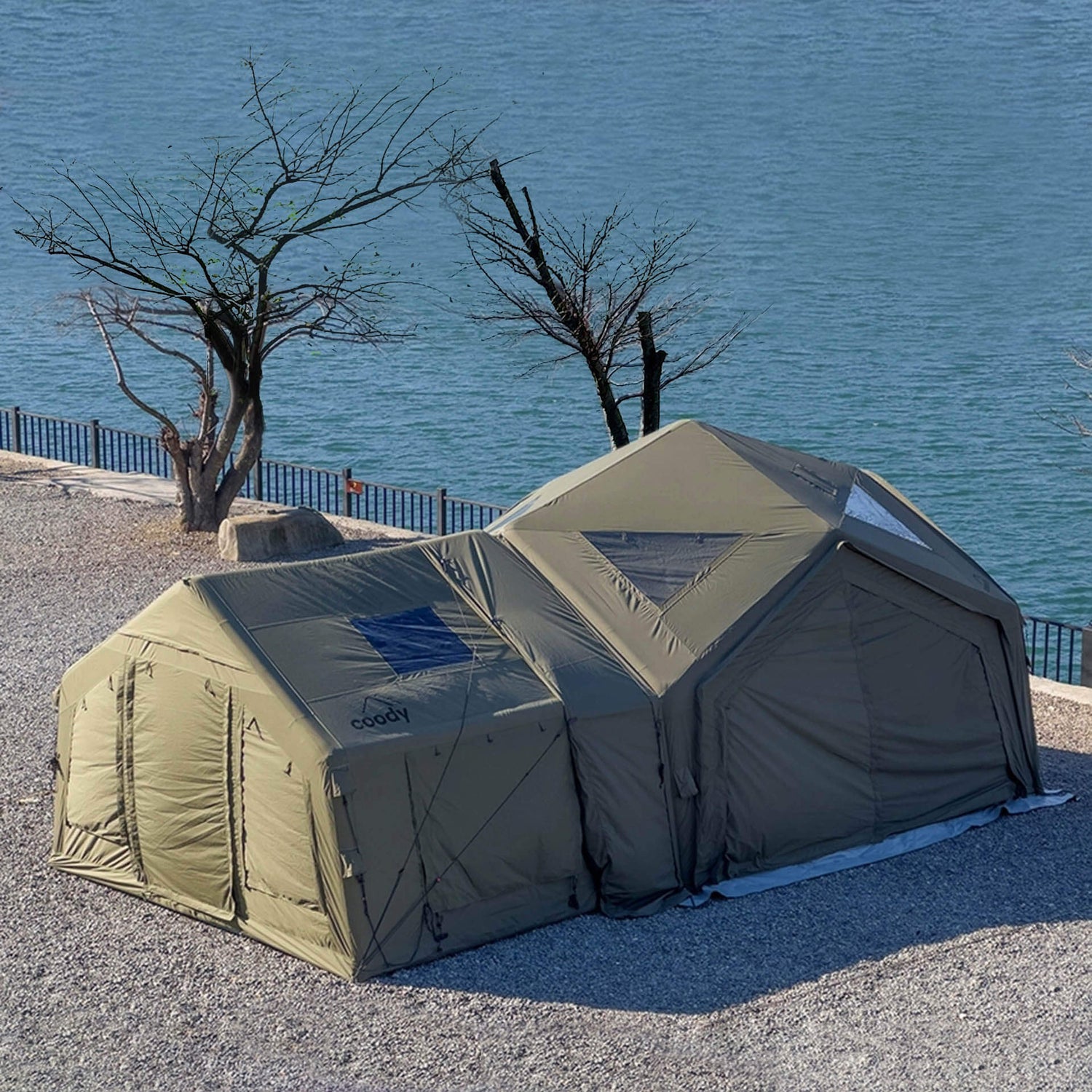 Inflatable group camping tent compatible with stove for cool weather