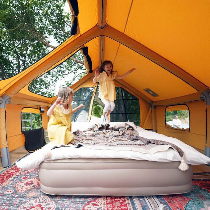 Spacious blow up tent with stove jack for 4 season camping adventures