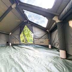 Large 4 season inflatable tent compatible with wood stove setup